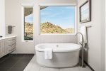 Draw a calming bath overlooking the Valley of the Sun